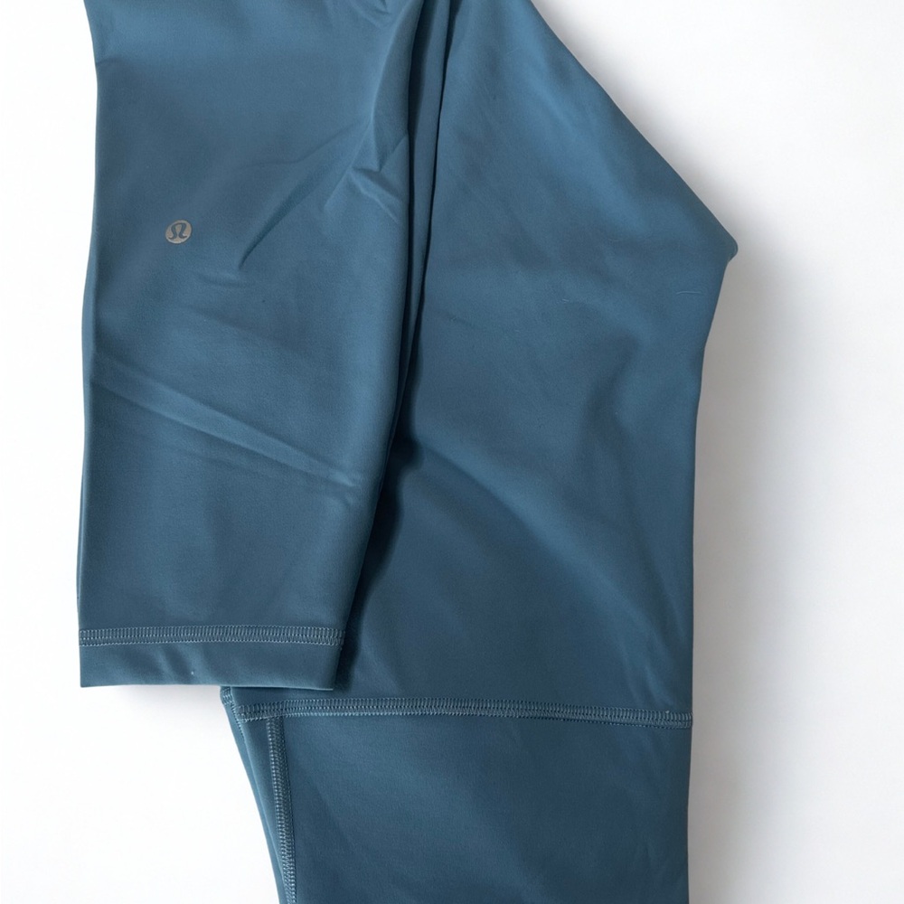 Lululemon Blue Leggings - New without tags.  Size 12 Length, 25 inseam